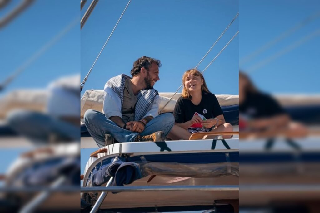 Imagem colorida de Greta Thunberg ao lado lado de Thiago Ávila